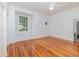 Bright bedroom with hardwood floors and a window seat at 5100 Linwood Cir, Sanford, FL 32771