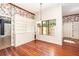 Dining area features built-in shelving, a large window, and elegant chandelier lighting at 5100 Linwood Cir, Sanford, FL 32771