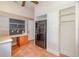 Cozy Kitchen offers built in shelving, workspace, and modern refrigerator at 5100 Linwood Cir, Sanford, FL 32771