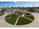 A serene fountain in a landscaped area within a community at 1585 Mulligan Blvd, Davenport, FL 33896
