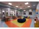 A colorful and inviting ' room with play areas and seating at 1585 Mulligan Blvd, Davenport, FL 33896
