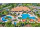 Resort-style pool, spa, and clubhouse with expansive patio area at 2310 Hamilton Ridge Rd, Clermont, FL 34715