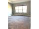Spacious bedroom with neutral carpeting and large windows at 2310 Hamilton Ridge Rd, Clermont, FL 34715