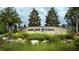 Highland Ranch community entrance with stone signage and landscaping at 2310 Hamilton Ridge Rd, Clermont, FL 34715
