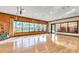 Community fitness room with hardwood floors and large windows at 2310 Hamilton Ridge Rd, Clermont, FL 34715