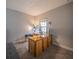 Bright home office features wood desk and ample natural light at 2310 Hamilton Ridge Rd, Clermont, FL 34715