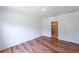 Well-lit bedroom featuring a closet and ensuite bath for added convenience at 2950 Gibraltar Blvd, New Smyrna Beach, FL 32168