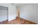 Spacious bedroom with wood floors, closet and neutral color palette at 2950 Gibraltar Blvd, New Smyrna Beach, FL 32168