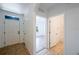 Bright foyer featuring tile flooring, a neutral palette, and open access to multiple rooms at 2950 Gibraltar Blvd, New Smyrna Beach, FL 32168