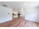 Bright living room featuring wood flooring and neutral paint at 2950 Gibraltar Blvd, New Smyrna Beach, FL 32168