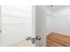 Spacious walk-in closet with metal shelving for ample storage and wood flooring at 2950 Gibraltar Blvd, New Smyrna Beach, FL 32168