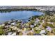 Stunning lakefront property with lush landscaping and private dock access to the beautiful blue lake at 301 Richard Pl, Orlando, FL 32806