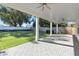 Covered patio with brick pavers and a fenced backyard at 1840 Biscayne Dr, Winter Park, FL 32789