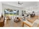 Spacious living area with an open floor plan and kitchen view at 1840 Biscayne Dr, Winter Park, FL 32789