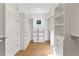 Spacious walk-in closet with ample shelving and drawers at 1840 Biscayne Dr, Winter Park, FL 32789