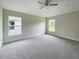 Spacious main bedroom with neutral walls and carpet flooring at 4376 Sagefield Dr, Harmony, FL 34773