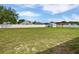 Large fenced backyard with grass and shed at 7856 Habersham Dr, Lakeland, FL 33810