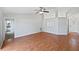 Open living room with vaulted ceilings, light walls, and hard flooring throughout at 7856 Habersham Dr, Lakeland, FL 33810