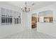 Bright dining area with tiled floors and access to the kitchen at 9313 Quiet Ln, Winter Garden, FL 34787