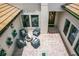 Charming courtyard with patio seating and pavers, ideal for outdoor relaxation at 10193 Brocksport Cir, Gotha, FL 34734