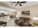 Open-concept living area with views into the dining and kitchen spaces at 2877 Attwater Loop, Winter Haven, FL 33884