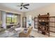 Comfortable sitting area with patio access, adjacent to a door to the main bedroom at 2877 Attwater Loop, Winter Haven, FL 33884