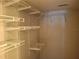 Organized walk-in closet featuring multiple tiers of white wire shelving at 1181 Paseo Del Mar # D, Casselberry, FL 32707