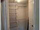 Walk-in closet featuring white wire shelving and bifold doors at 1181 Paseo Del Mar # D, Casselberry, FL 32707