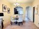 Inviting dining area with seating for four with natural light at 4032 Mountain Chestnut Way, Lakeland, FL 33812