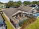 Aerial view showcasing the home's private pool and backyard at 313 Kensington Dr, Davenport, FL 33897
