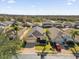 Aerial view of the home and surrounding neighborhood at 313 Kensington Dr, Davenport, FL 33897