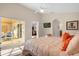 King bed with access to backyard and living room at 313 Kensington Dr, Davenport, FL 33897