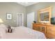 Bright bedroom with king-size bed and plenty of closet space at 313 Kensington Dr, Davenport, FL 33897