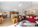 Open living space with a view of kitchen, dining, and access to the pool at 313 Kensington Dr, Davenport, FL 33897
