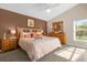 King bed, large windows, and access to backyard at 313 Kensington Dr, Davenport, FL 33897