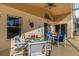 Enjoyable patio with table and chairs, perfect for outdoor dining at 313 Kensington Dr, Davenport, FL 33897