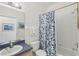 Standard bathroom featuring a tub, shower, and vanity with a large mirror at 475 Windsor Pl, Davenport, FL 33896