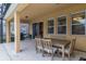 Comfortable outdoor seating area with grill, perfect for entertaining and enjoying outdoor living at 6047 Broad Oak Dr, Davenport, FL 33837