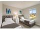 Guest bedroom with two twin beds and window at 233 Macaulay S Cv, Haines City, FL 33844
