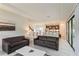 Open living room with view into kitchen and dining area at 233 Macaulay S Cv, Haines City, FL 33844
