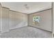 Comfortable bedroom with neutral colored walls and a window for natural light at 9100 Sw 32Nd Ct, Ocala, FL 34476