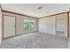 Bright and airy living room featuring lots of natural light and fresh carpeting at 9100 Sw 32Nd Ct, Ocala, FL 34476