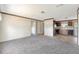 Spacious living area open to the kitchen and bathroom at 9100 Sw 32Nd Ct, Ocala, FL 34476