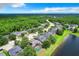 Aerial view of neighborhood homes featuring screened-in pools at 3872 Heirloom Rose Pl, Oviedo, FL 32766