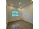 Bright bedroom with laminate floors and lots of natural light at 1102 East Pkwy, Deland, FL 32724