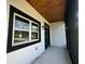 View of the front door from covered porch area at 1102 East Pkwy, Deland, FL 32724