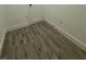 Close-up of wood-look tile flooring with light grout and clean lines at 1102 East Pkwy, Deland, FL 32724