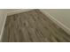 Close up view of wood-look tile flooring at 1102 East Pkwy, Deland, FL 32724