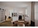 Bright kitchen and dining area with modern appliances, white cabinetry, and stylish lighting at 1102 East Pkwy, Deland, FL 32724