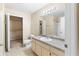 Bathroom with a sink, vanity, toilet, and a shower/tub combination at 3383 Westchester Square Blvd # 204, Orlando, FL 32835